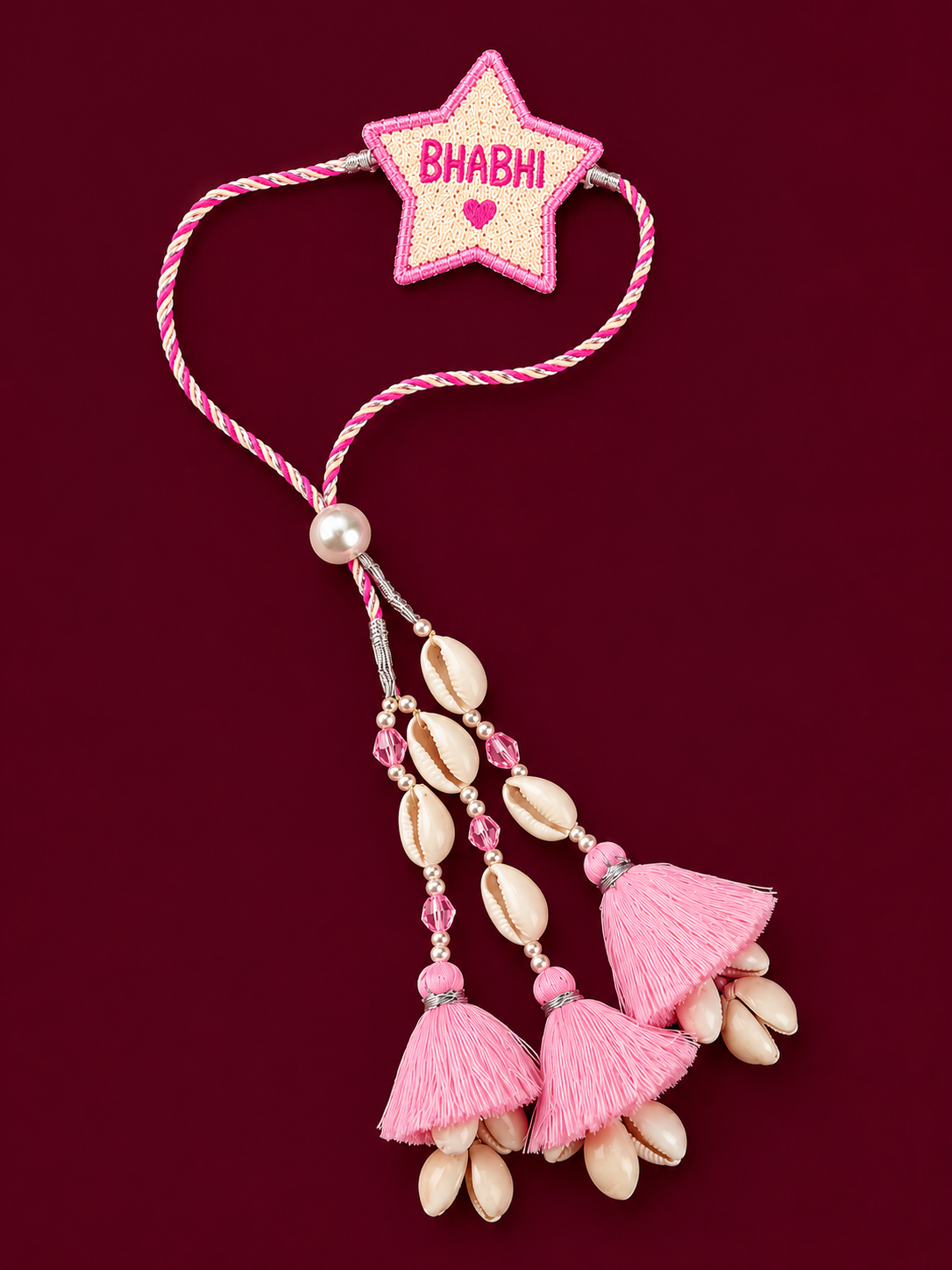 Bhabhi Star Lumba Rakhi with Pink Tassels & Cowrie Shells