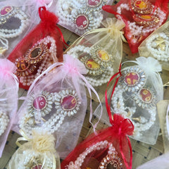 Bracelate Ring Combo With Potli