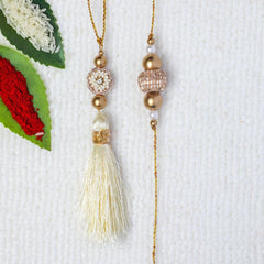 Golden Pearl Tassel Rakhi for Bhai & Bhabhi